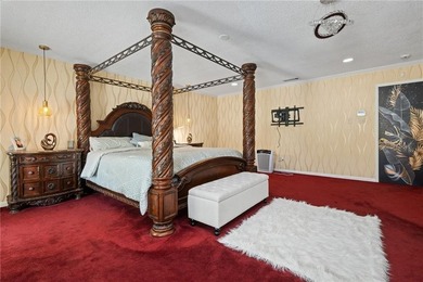 This gated estate offers a lavish, resort-style atmosphere where - photo 32