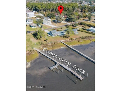 Experience elevated coastal living in this impeccably crafted