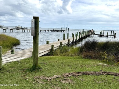 Experience elevated coastal living in this impeccably crafted