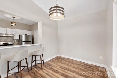 Enjoy effortless lakeside living in this beautifully updated