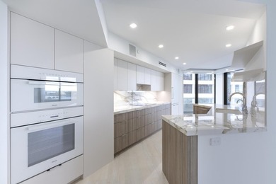 Sleek, modern and luxuriously fully renovated unit. Three - photo 9