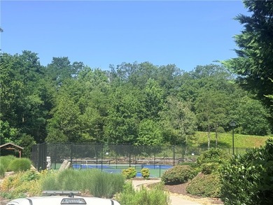 Perched on a private cul-de-sac within the prestigious gated - photo 12