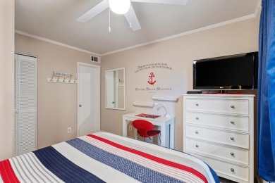 This beautifully updated, rarely available, corner unit, located