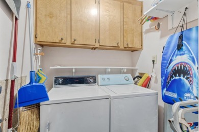 This beautifully updated, rarely available, corner unit, located