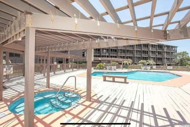 This beautifully updated, rarely available, corner unit, located