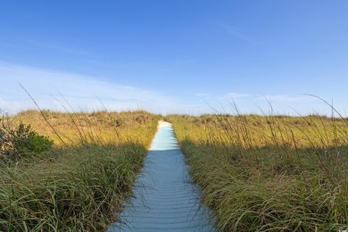 This beautifully updated, rarely available, corner unit, located