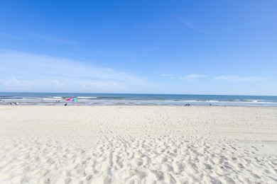 This beautifully updated, rarely available, corner unit, located