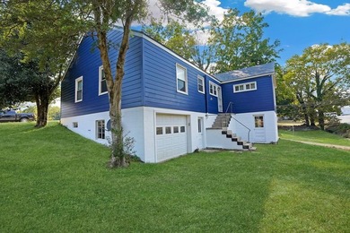 This charming home is loaded with character! Lovely tile front - photo 2