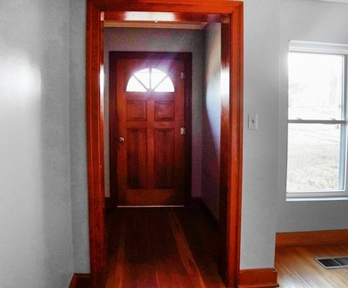 This charming home is loaded with character! Lovely tile front - photo 5