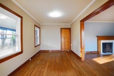 This charming home is loaded with character! Lovely tile front - photo 6