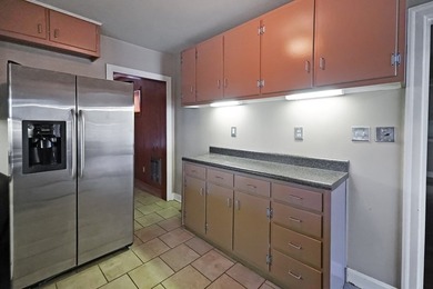 This charming home is loaded with character! Lovely tile front - photo 10