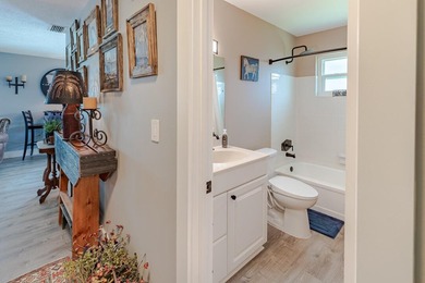 Beautifully updated 2BD/2BA corner residence featuring impact - photo 22