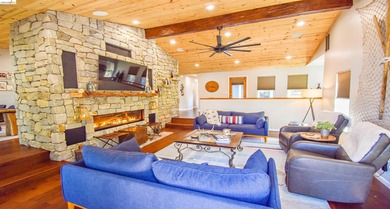 LAKEFRONT LIVING, WITH SWEEPING, PANORAMIC LAKE & MOUNTAIN - photo 9