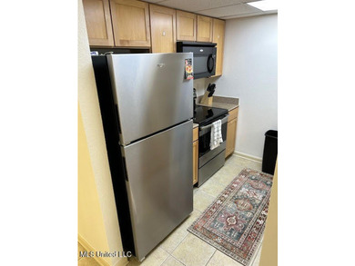 This charming 2 bedroom, 1.5 bath end unit condo is ideally - photo 11