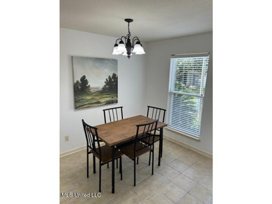 This charming 2 bedroom, 1.5 bath end unit condo is ideally - photo 12