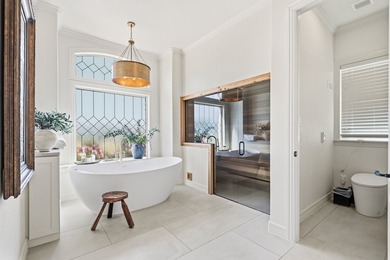 This fully remodeled 6,514 square foot estate offers an - photo 8