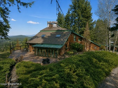 Set on 9.81 private acres with rare dual lake views of Fernan - photo 13