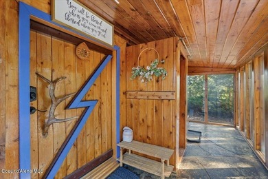 Set on 9.81 private acres with rare dual lake views of Fernan - photo 14