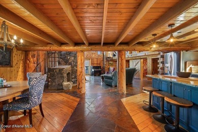 Set on 9.81 private acres with rare dual lake views of Fernan - photo 15