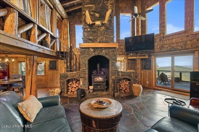 Set on 9.81 private acres with rare dual lake views of Fernan - photo 17