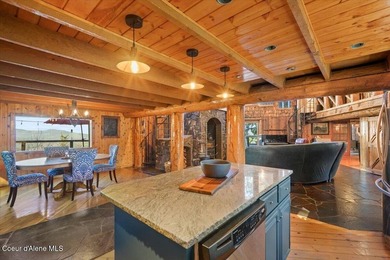 Set on 9.81 private acres with rare dual lake views of Fernan - photo 20