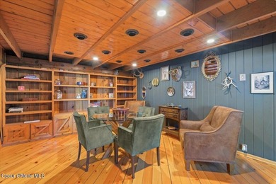 Set on 9.81 private acres with rare dual lake views of Fernan - photo 22