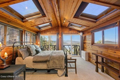 Set on 9.81 private acres with rare dual lake views of Fernan - photo 23