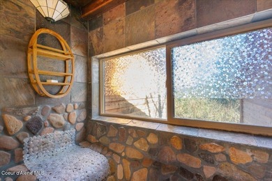 Set on 9.81 private acres with rare dual lake views of Fernan - photo 26