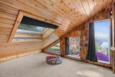 Set on 9.81 private acres with rare dual lake views of Fernan - photo 34