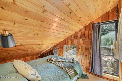 Set on 9.81 private acres with rare dual lake views of Fernan - photo 37