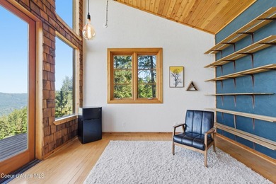 Set on 9.81 private acres with rare dual lake views of Fernan - photo 41