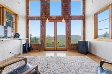 Set on 9.81 private acres with rare dual lake views of Fernan - photo 43