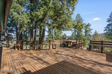 Set on 9.81 private acres with rare dual lake views of Fernan - photo 45