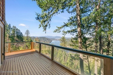 Set on 9.81 private acres with rare dual lake views of Fernan - photo 47