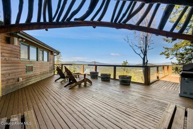 Set on 9.81 private acres with rare dual lake views of Fernan - photo 48