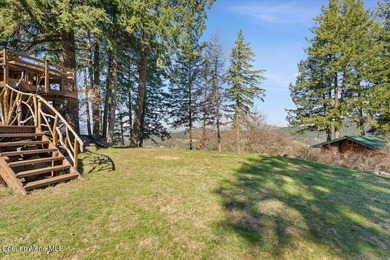 Set on 9.81 private acres with rare dual lake views of Fernan - photo 49