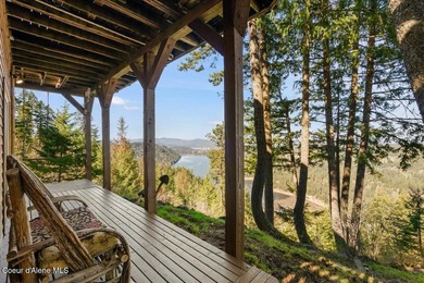 Set on 9.81 private acres with rare dual lake views of Fernan - photo 50