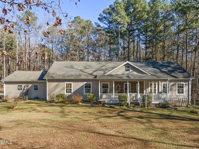 Country living at its best on this 1.50 acre lot boasting three