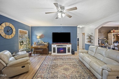 Country living at its best on this 1.50 acre lot boasting three