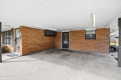 This well-maintained 3-bedroom brick home in Long Beach offers a - photo 5