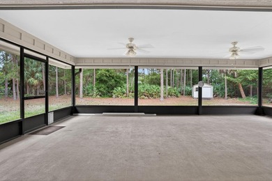 Enjoy peaceful country living in Jupiter Farms with this - photo 32
