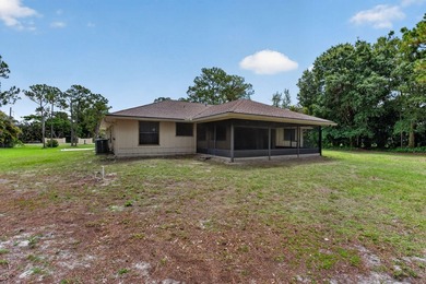 Enjoy peaceful country living in Jupiter Farms with this - photo 40