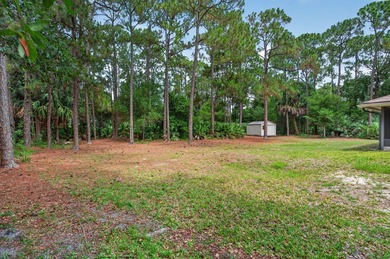 Enjoy peaceful country living in Jupiter Farms with this - photo 44
