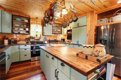 Nestled along the serene Elk River, Lazy K offers a rare - photo 12