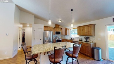 2023-built home set on nearly an acre of level, usable land - photo 15