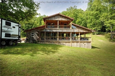 Nestled along the serene Elk River, Lazy K offers a rare - photo 17