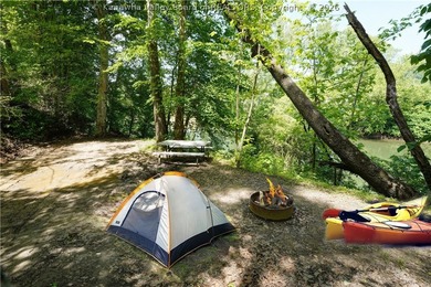 Nestled along the serene Elk River, Lazy K offers a rare - photo 21