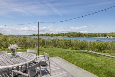 Where sweeping views over Three Mile Harbor meet the quiet charm - photo 24