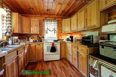 Nestled along the serene Elk River, Lazy K offers a rare - photo 25