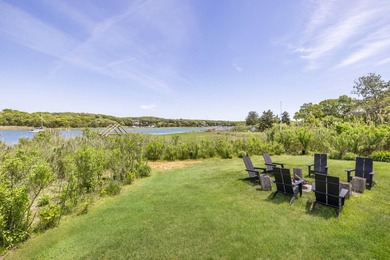 Where sweeping views over Three Mile Harbor meet the quiet charm - photo 26